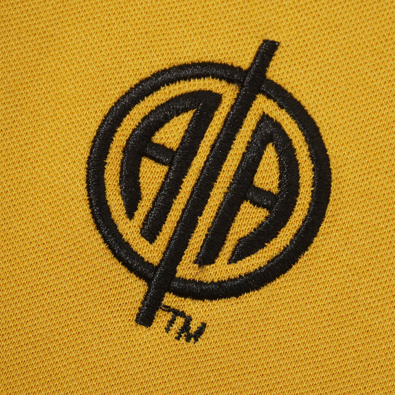 Alpha Exclusive & Proprietary Logo Gold Polo